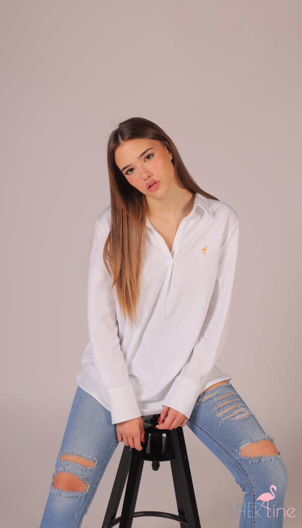 White blouse with gold logo 